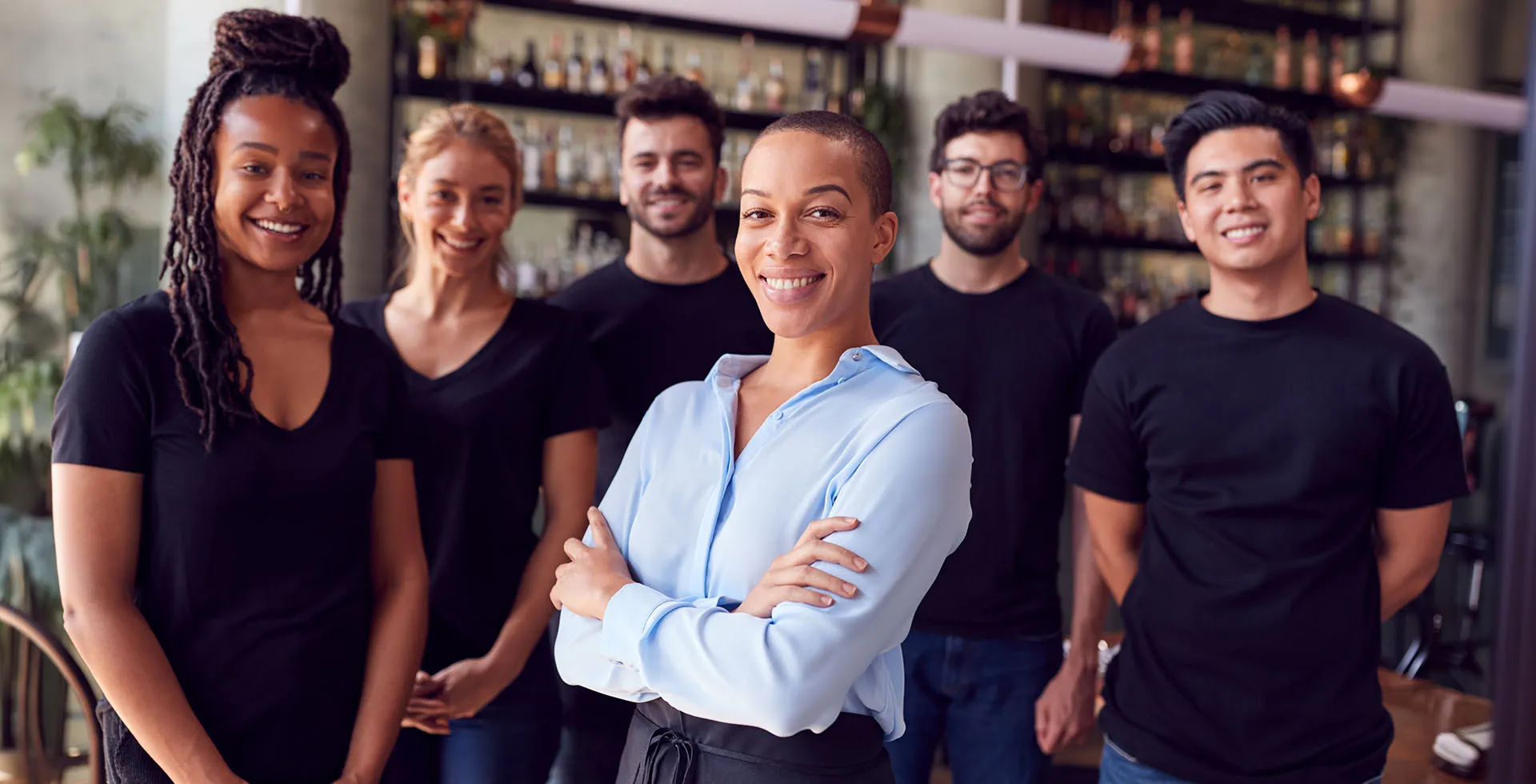 Employees of Private Palace Hotels & Resorts stand together in a professional setting