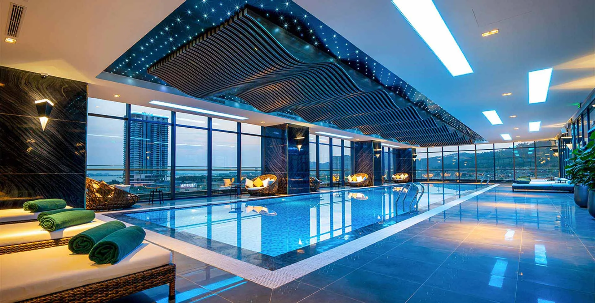 Indoor pool with panoramic view in the wellness area of DeLaSol Phat Linh Hotel in Sapa Vietnam