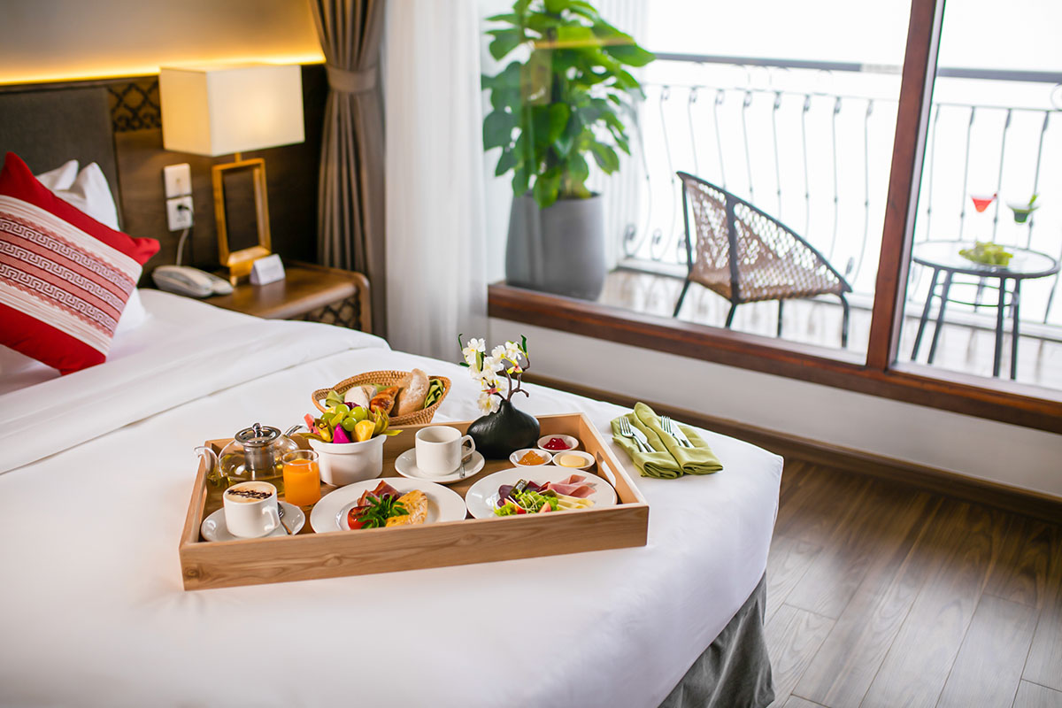 Fresh breakfast served on a tray in a room at DeLaSol Phat Linh Hotel Sapa